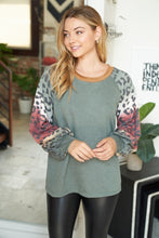 Long sleeve solid knit top with a round neck featuring a puff sleeve and a leopard print trim - Ivory or Olive