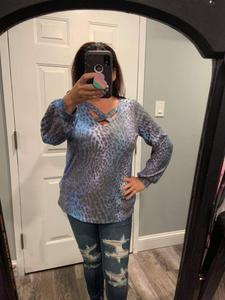 A PLUS SIZE long sleeve leopard print knit top with a v-neck featuring a criss cross detail and a puff sleeve - 💙 Blue/Purple 💜