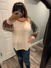 PLUS SIZE Long sleeve solid knit top with a round neck featuring a puff sleeve and a leopard print trim - Ivory or Olive