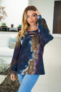 Tie dye knit top with a v-neck featuring a cut out trim detail and a puff sleeve -  Navy/Purple Mix