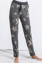 Star and animal print pants featured with drawstring and pockets