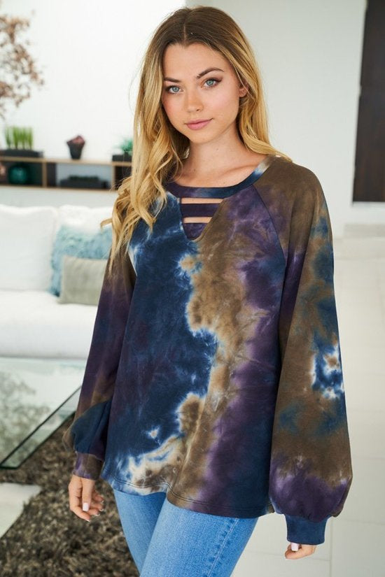 Tie dye knit top with a v-neck featuring a cut out trim detail and a puff sleeve -  Navy/Purple Mix