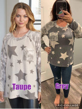 Long sleeve star print knit top with a round neck featuring a tie dye patch pocket, tie dye trim, and a side slit - Grey or Taupe