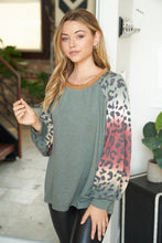 Long sleeve solid knit top with a round neck featuring a puff sleeve and a leopard print trim - Ivory or Olive