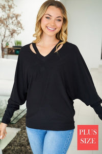 Plus long sleeve solid knit top with a v-neck featuring a cut out detail and a dolman sleeve - Black, Fuchsia or Royal Blue