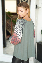 Long sleeve solid knit top with a round neck featuring a puff sleeve and a leopard print trim - Ivory or Olive