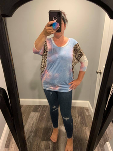 Plus Size - A 3/4 sleeve tie dye knit top with a scoop neck featuring a dolman sleeve and leopard print trim detail - Light Blue.