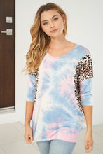 White Birch 3/4 sleeve tie dye knit top with a scoop neck featuring a dolman sleeve and leopard print trim detail - Light Blue.