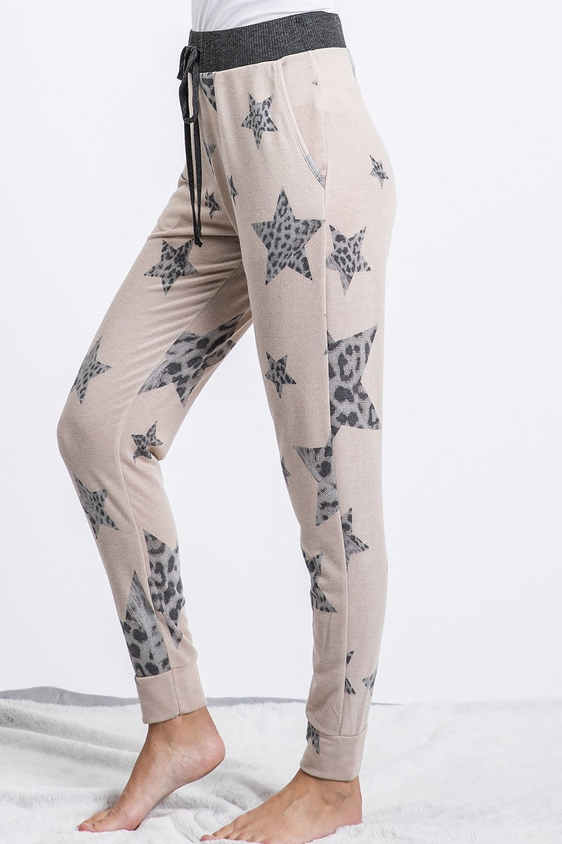 Star and animal print pants featured with drawstring and pockets