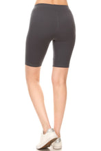Solid, high waisted, biker shorts in a fitted style with an elastic waistband - Black