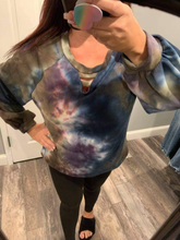 Tie dye knit top with a v-neck featuring a cut out trim detail and a puff sleeve -  Navy/Purple Mix