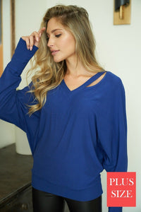 Plus long sleeve solid knit top with a v-neck featuring a cut out detail and a dolman sleeve - Black, Fuchsia or Royal Blue