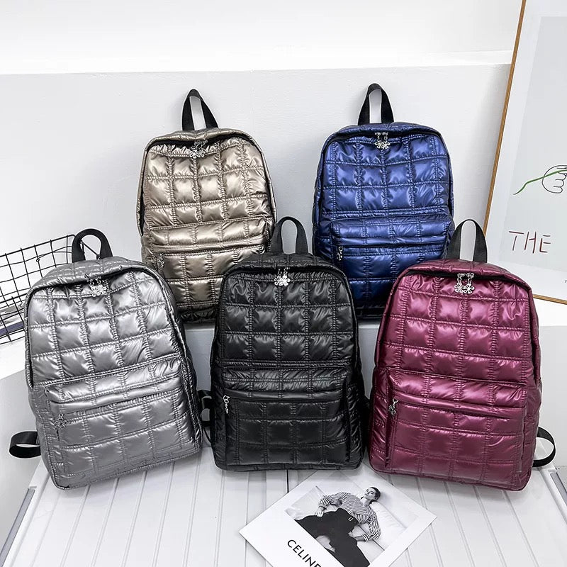 Silver quilted backpack sale