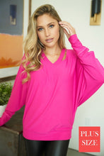 Plus long sleeve solid knit top with a v-neck featuring a cut out detail and a dolman sleeve - Black, Fuchsia or Royal Blue