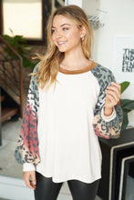 Long sleeve solid knit top with a round neck featuring a puff sleeve and a leopard print trim - Ivory or Olive