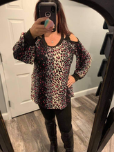 A long sleeve neon leopard print knit top with a round neck featuring a puff sleeve and a cut out detail - Grey/Black/Neon Pink